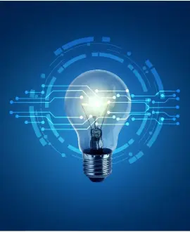 Light bulb surrounded by digital circuitry, symbolizing innovation and the continuous evolution of designs in commercial real estate, setting new benchmarks for quality in property development.