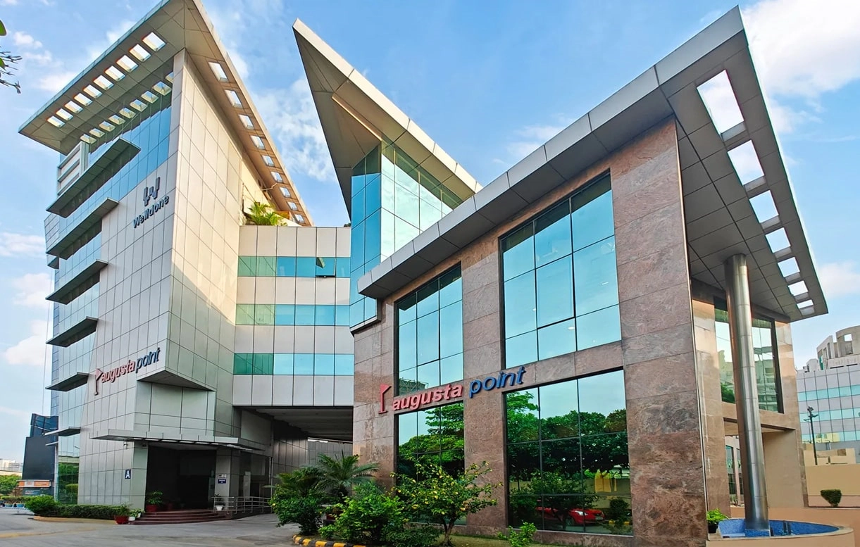 Exterior shot of Augusta Point, delivered by Good Earth Infra in 2005. Located on Gold Course Road, Gurugram, it offers prime office and retail spaces and marks the beginning of the company's journey in commercial real estate development.