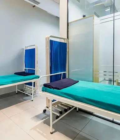 Medical facility at Good Earth Business Bay II, Gurugram, equipped with clean beds and partitions, offering healthcare support to employees, tenants and visitors within the commercial building.