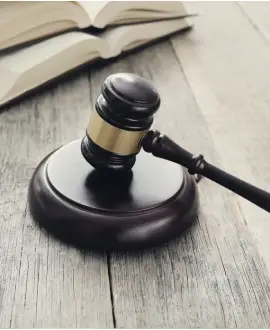 Wooden gavel symbolizing governance, responsibility, and transparency in managing commercial real estate and client relationships.