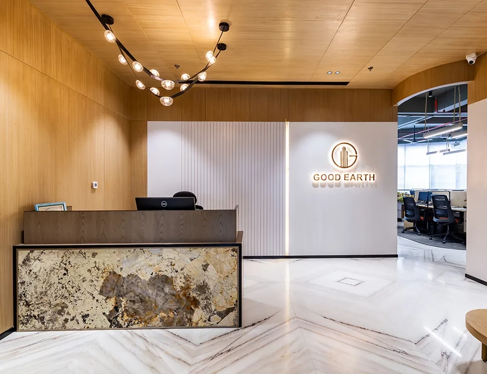 Front desk reception area at Good Earth Infra.