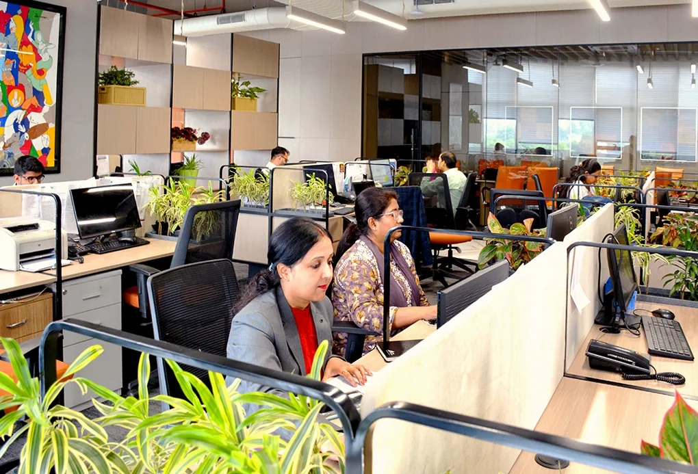 Open office space at Good Earth Infra, featuring a collaborative and professional environment for commercial real estate operations