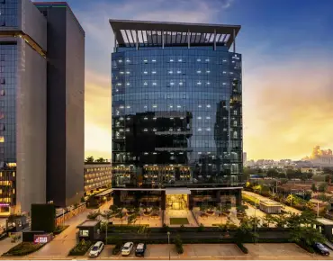 Good Earth Trade Tower, a premium mixed-use commercial project in Sector 62, Golf Course Extension, Gurugram, designed for leasing high-end office and retail spaces.