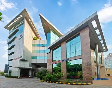 Augusta Point, a modern commercial office building located on Golf Course Road, Gurugram, offering premium office spaces designed for businesses.